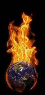 Fiery wallpaper of Earth engulfed in flames on black background.