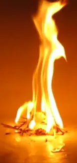 Aesthetic burning flame with orange hues wallpaper.