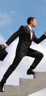 Businessman in suit climbing stairs with blue sky.