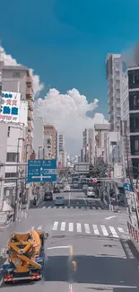 Bustling city street with blue sky and vibrant urban details.