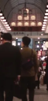 Bustling market scene with people walking under warm lights.