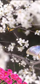 Butterflies amid cherry blossoms and pink flowers create a vibrant spring wallpaper.