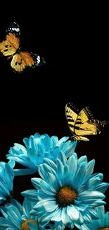 Colorful butterflies and blue flowers on black background wallpaper.