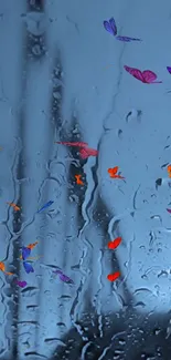 Colorful butterflies on a rainy window wallpaper.