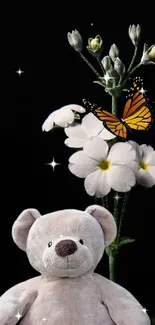 Teddy bear with butterfly and flowers on black background.