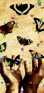 Hands releasing colorful butterflies on a sepia background.