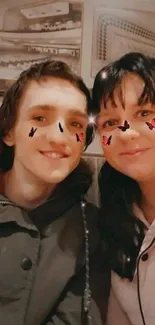 Couple smiling with playful butterfly filter.