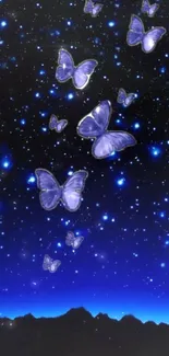 Butterflies in a starry galaxy night sky wallpaper.