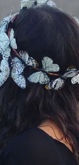 Mobile wallpaper with butterfly hairpiece.