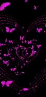 Neon pink butterflies forming a heart on black background.