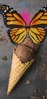Creative ice cream cone with butterfly wings against a gray background.
