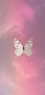 Whimsical butterfly in a pink sky with dreamy clouds wallpaper