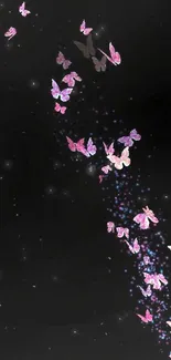 Butterflies in a dark night sky mobile wallpaper.