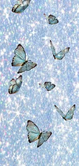 Blue butterflies on a sparkling, glittering background.