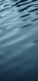 Gentle blue water ripples on a calm surface wallpaper.