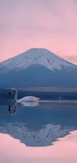 A serene mountain lake at sunset with a swan and peaceful reflections.