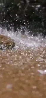 Serene rainfall on river rocks wallpaper.