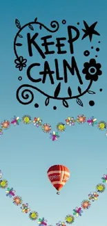 Blue gradient wallpaper with "Keep Calm" and heart-shaped balloon.