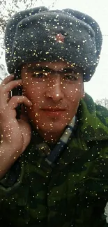 Soldier in camouflage speaking on phone outdoors.