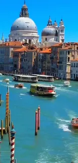 View of Venice's Canal Grande with historic buildings and boats.