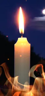 Glowing candle with flames under a moonlit sky.