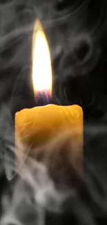 Golden candle with smoke rising in a dark background, creating a serene atmosphere.