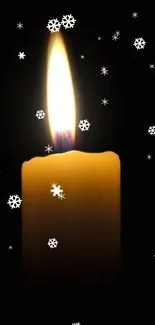 Candle flickering with surrounding snowflakes on a dark background.