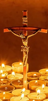 Candlelit crucifix with glowing candles mobile wallpaper.