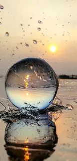 A mesmerizing sunrise reflecting in a spherical water drop on the surface.