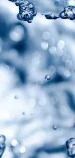 Close-up of water droplets in blue hues creating a tranquil background.