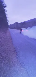 Car drifting with smoke on a scenic road.