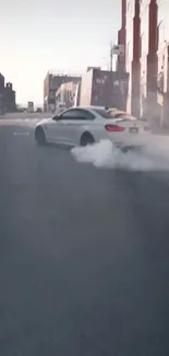 Car drifting on a smoky urban street.