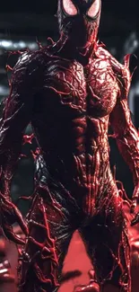 Carnage symbiote character in a vivid red and black mobile wallpaper.