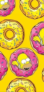 Cartoon donut design on yellow phone wallpaper.