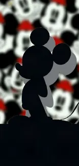 Silhouette of a cartoon mouse with a colorful background.