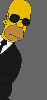 Cartoon character in a black suit peeking out on a gray background.