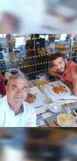 Friends enjoying a meal in a casual dining setting.