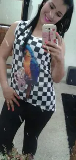 Mirror selfie with parrot shirt and phone case.