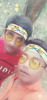 Two friends outdoors with sunglasses, headbands.