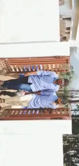 Two people walking through a wooden gate with a natural backdrop.