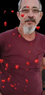 Portrait of a man in a burgundy shirt outdoors.