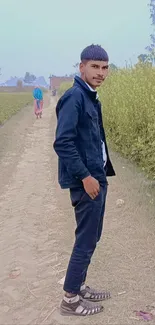 Person walking on a rural path in the countryside.