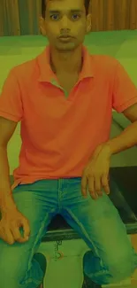 Person in orange shirt with casual style.