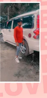 Person in red shirt with SUV on pink background.