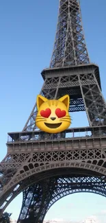 Eiffel Tower with heart-eyed cat emoji on a clear day.