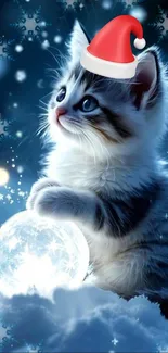 Cute kitten with Santa hat in snowy setting.