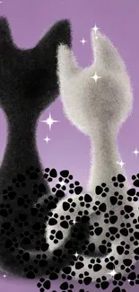 Black and white cat silhouettes with paw prints on a purple background.