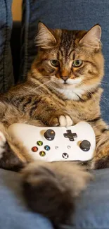 Cat lounges with game controller on chair.