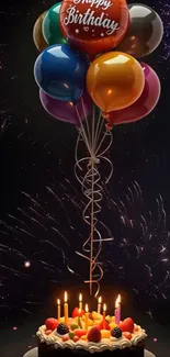 Birthday cake with balloons and candles against dark background.