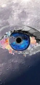 Artistic cosmic blue eye with lunar backdrop and floral accents.